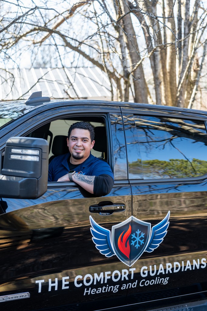 Comfort Guardians technician in service vehicle